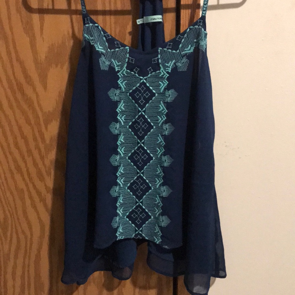 T-back flowy tank, can fit a small or medium